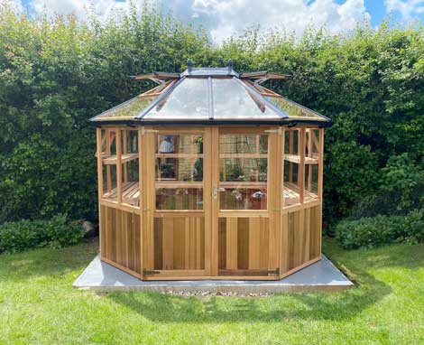 Cedar Greenhouse with tempered glass and panels Cedar Greenhouse with tempered glass and panels