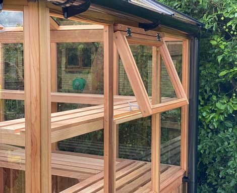 Cedar Greenhouse with tempered glass and panels Cedar Greenhouse with tempered glass and panels
