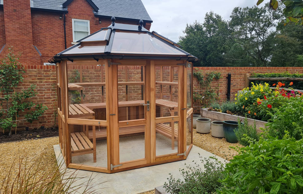 10x8 timber Round Greenhouse The Stramburg fitted with staging