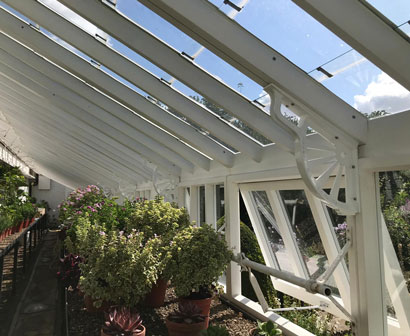 slide A greenhouse with painted finish