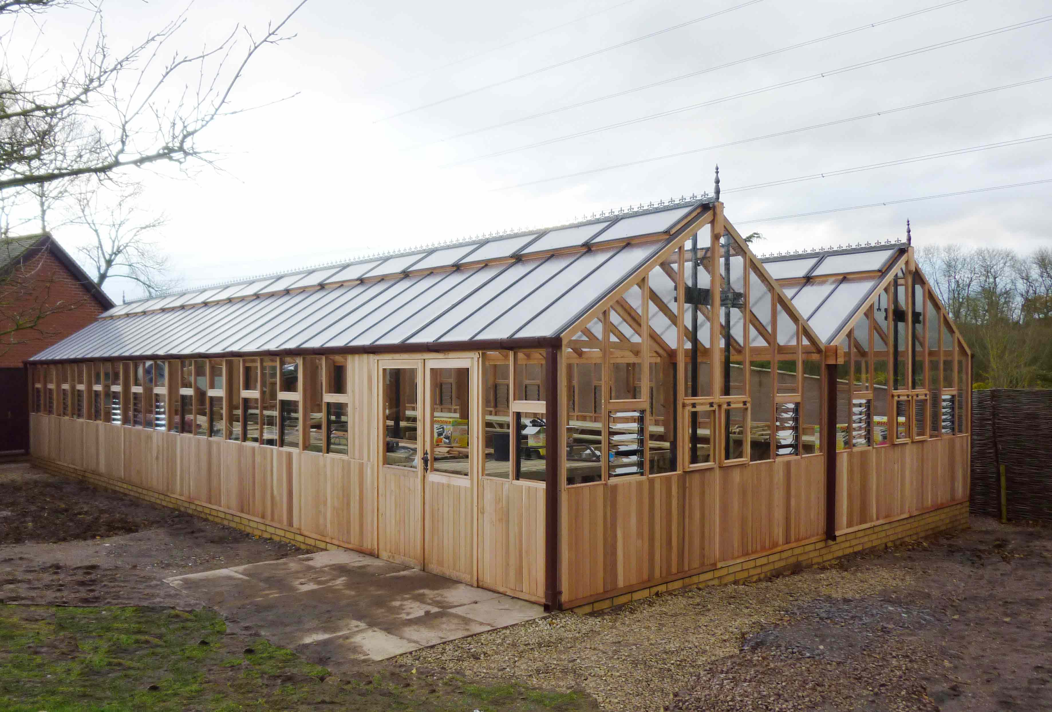 26ft x 56ft Western Red Cedar twin gable commercial greenhouse