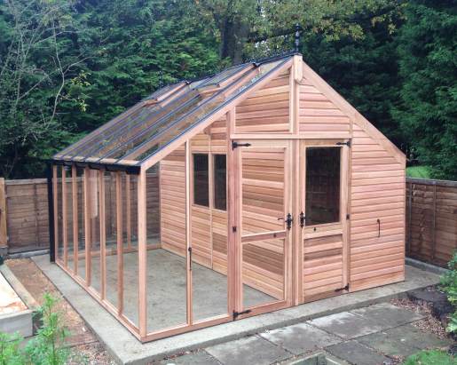 12ft x 12ft Centaur greenhouse with Cedar Shingle roof. Fitted with a 